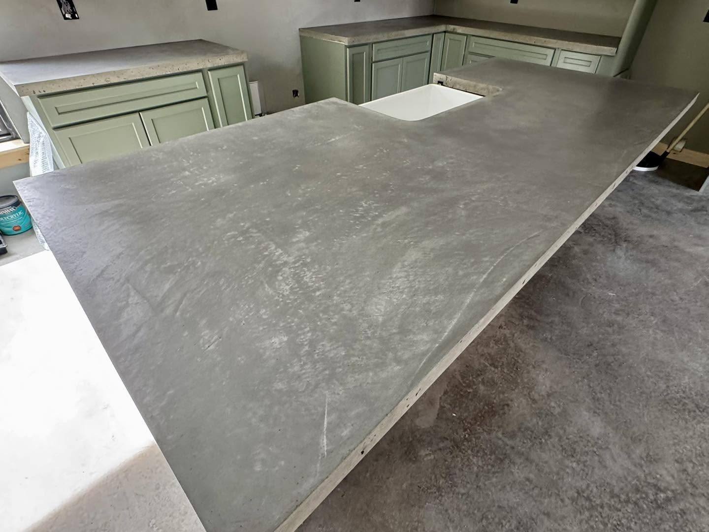 Edge detail of a polished concrete kitchen island countertop in Winchester VA