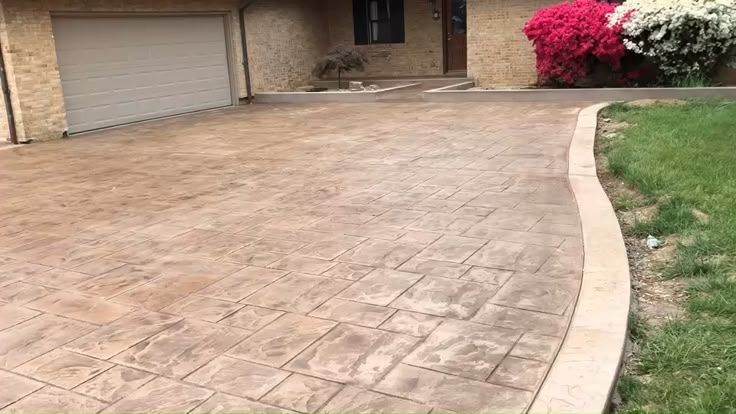 Stamped concrete driveway leading up to a garage in Winchester VA