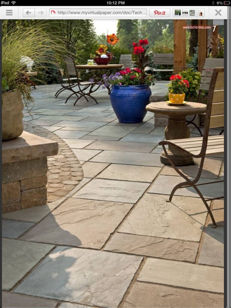 Stamped concrete patio with a flagstone pattern and pergola in Winchester VA