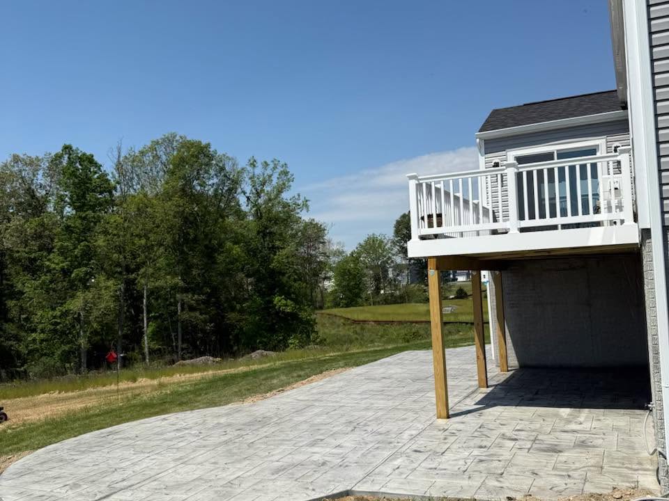 Concrete pad poured under a raised deck in Winchester VA