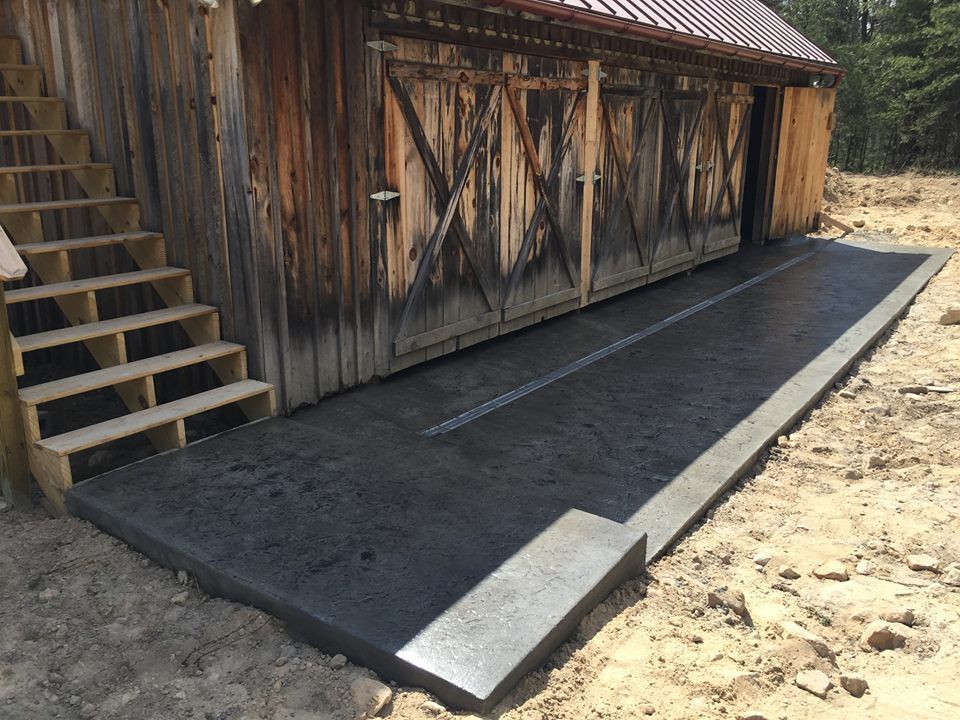 Stamped concrete floor inside a rustic pole barn in Winchester VA